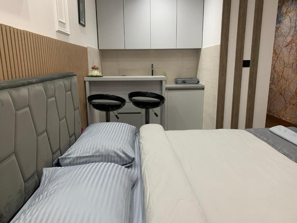 Postel nebo postele na pokoji v ubytování AD luxury