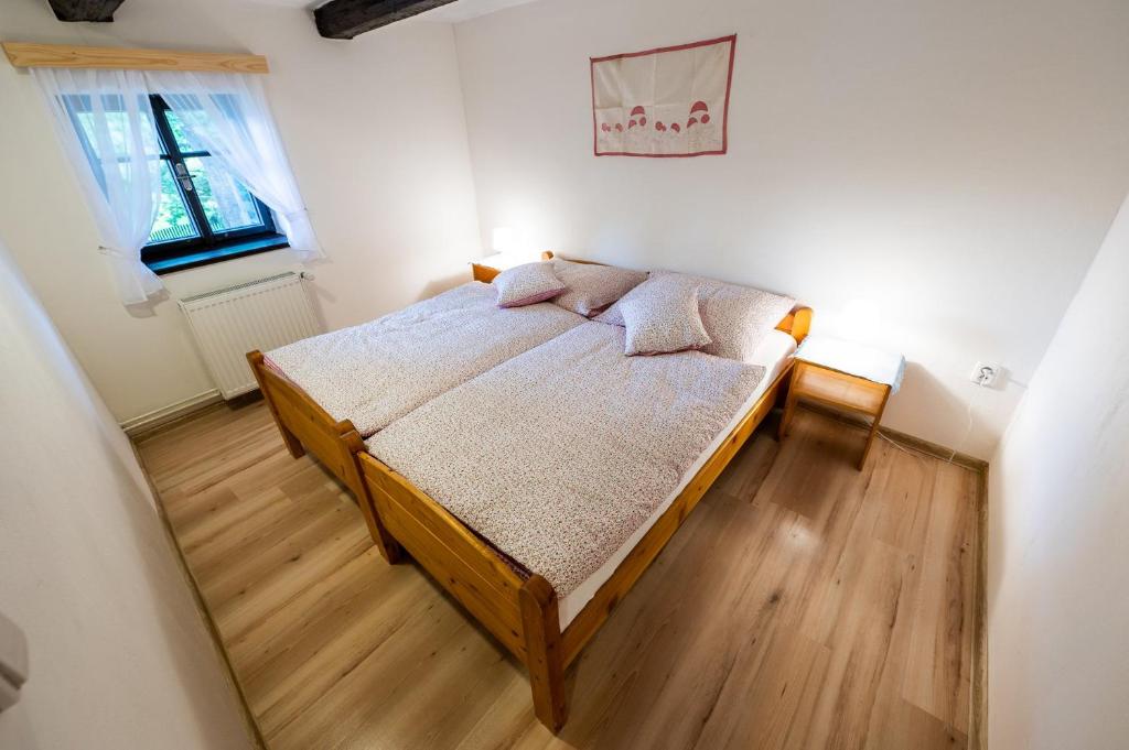Postel nebo postele na pokoji v ubytování Penzion Pod hradem