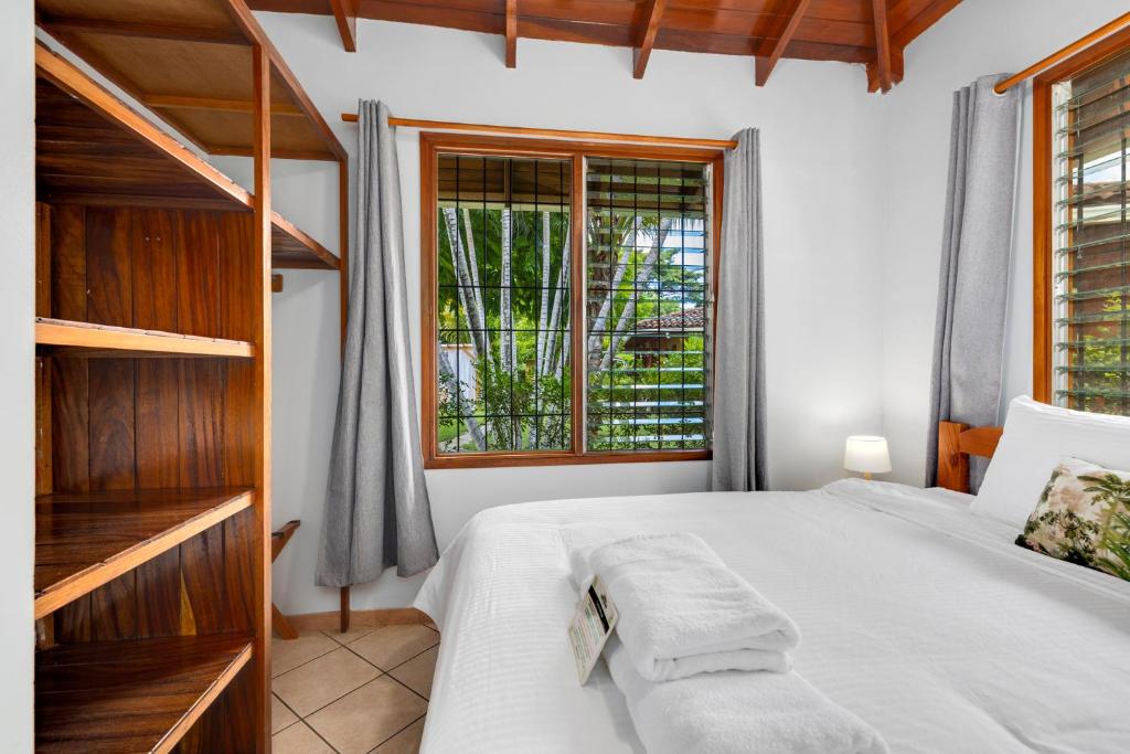 Postel nebo postele na pokoji v ubytování Hotel Bahia Esmeralda