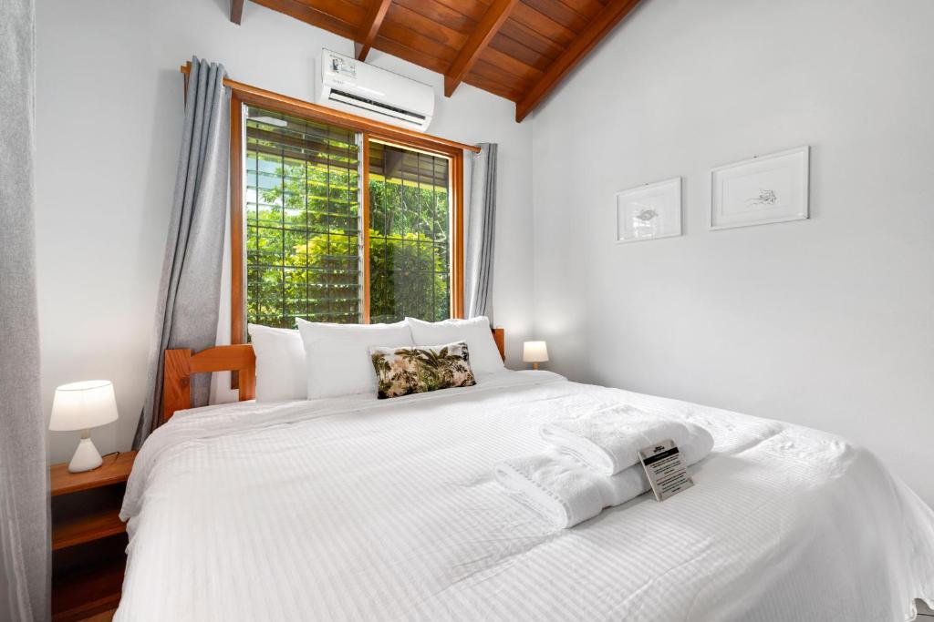 Postel nebo postele na pokoji v ubytování Hotel Bahia Esmeralda