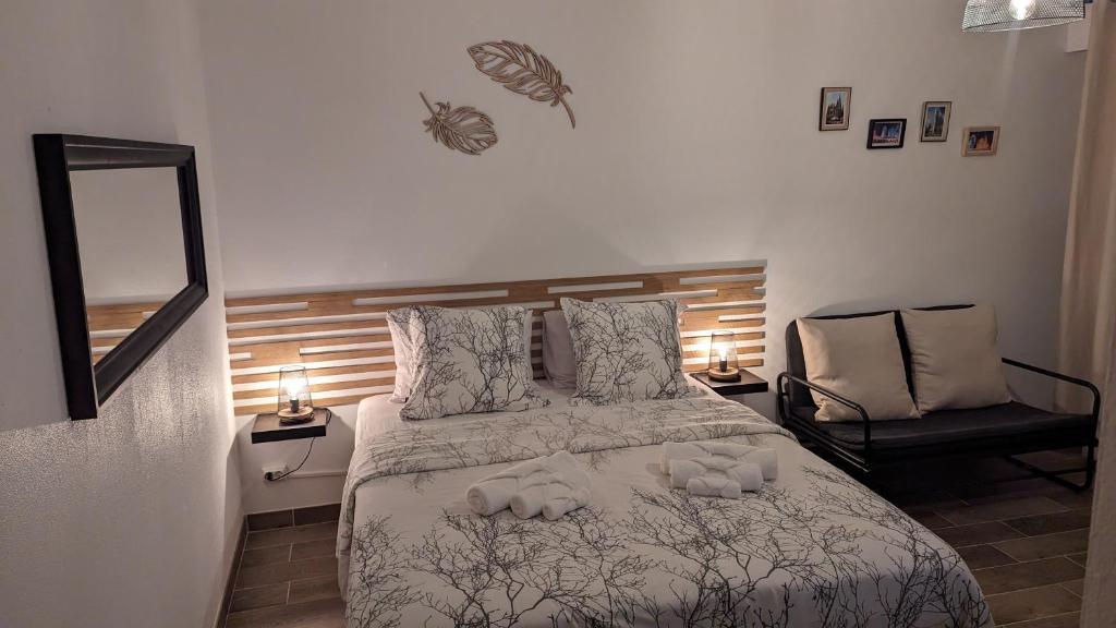 Un pat sau paturi într-o cameră la Escapade Mulhousienne