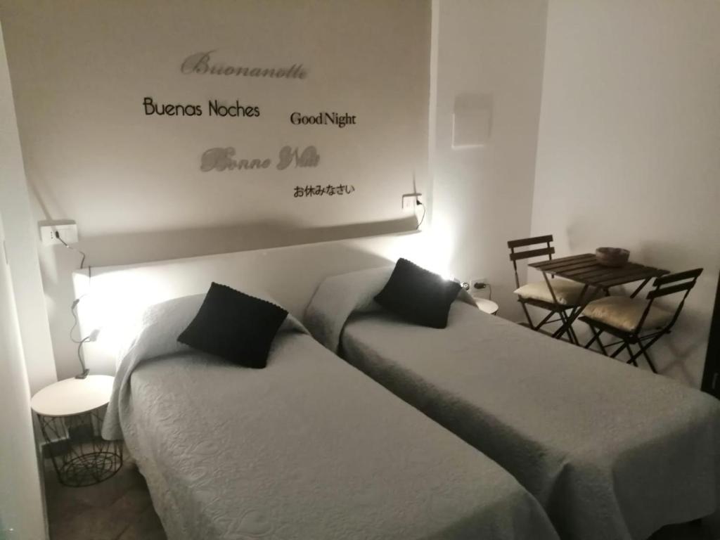 Letto o letti in una camera di A casa di Sara