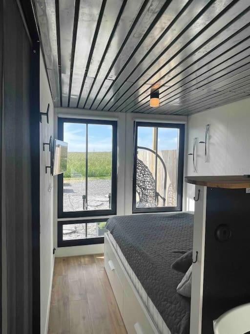 Postel nebo postele na pokoji v ubytování Container