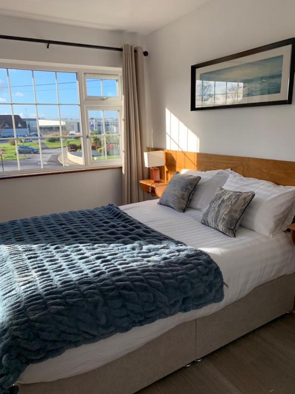 Katil atau katil-katil dalam bilik di Carranross Accommodation