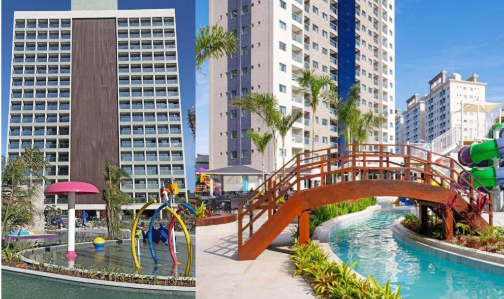 een waterpark met een brug en een waterglijbaan bij Salinas Resorts Exclusive, Premium e Park - Elcias Silva in Salinópolis