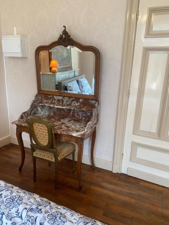 Un ou plusieurs lits dans un hébergement de l'établissement Château de Porcheresse