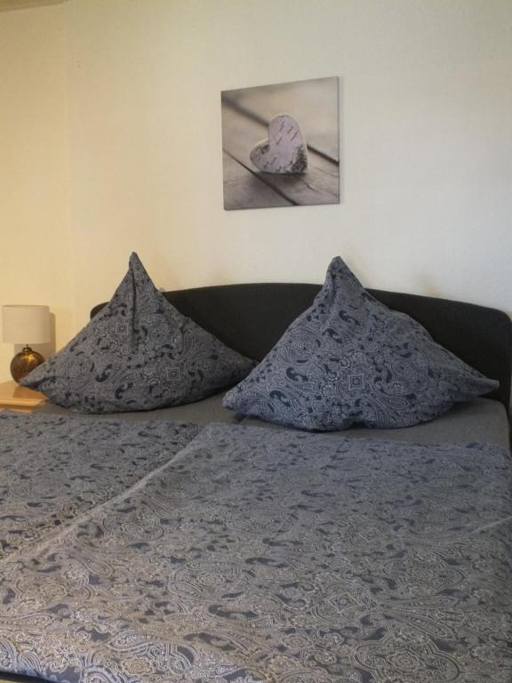 Postel nebo postele na pokoji v ubytování Ferienpark Buntspecht Bungalow 7