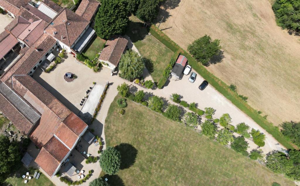 an overhead view of a house with a yard at Gites de Cognac in Bréville