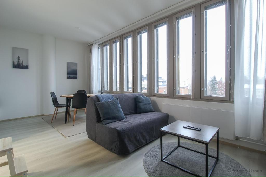 Posezení v ubytování Pramea Apartments Pankkitalo