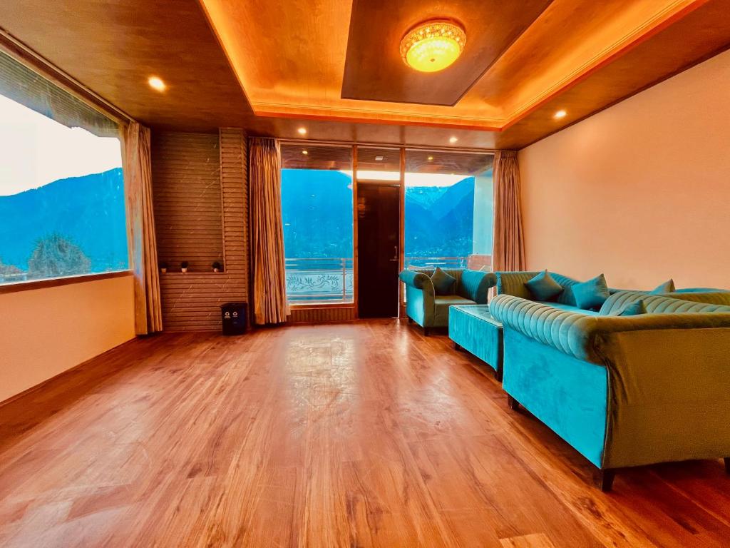 Posezení v ubytování Rockland Cottage, Manali - Centrally Heated & Air Cooled Premium Rooms