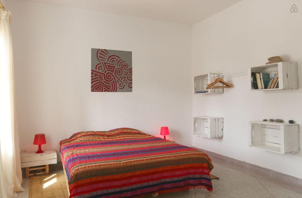 Postel nebo postele na pokoji v ubytování Villa vue mer Mirleft - ménage et Cuisinière à mi-temps