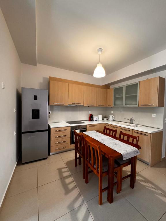 Kuchyň nebo kuchyňský kout v ubytování Porto Rafti Holiday Apartment