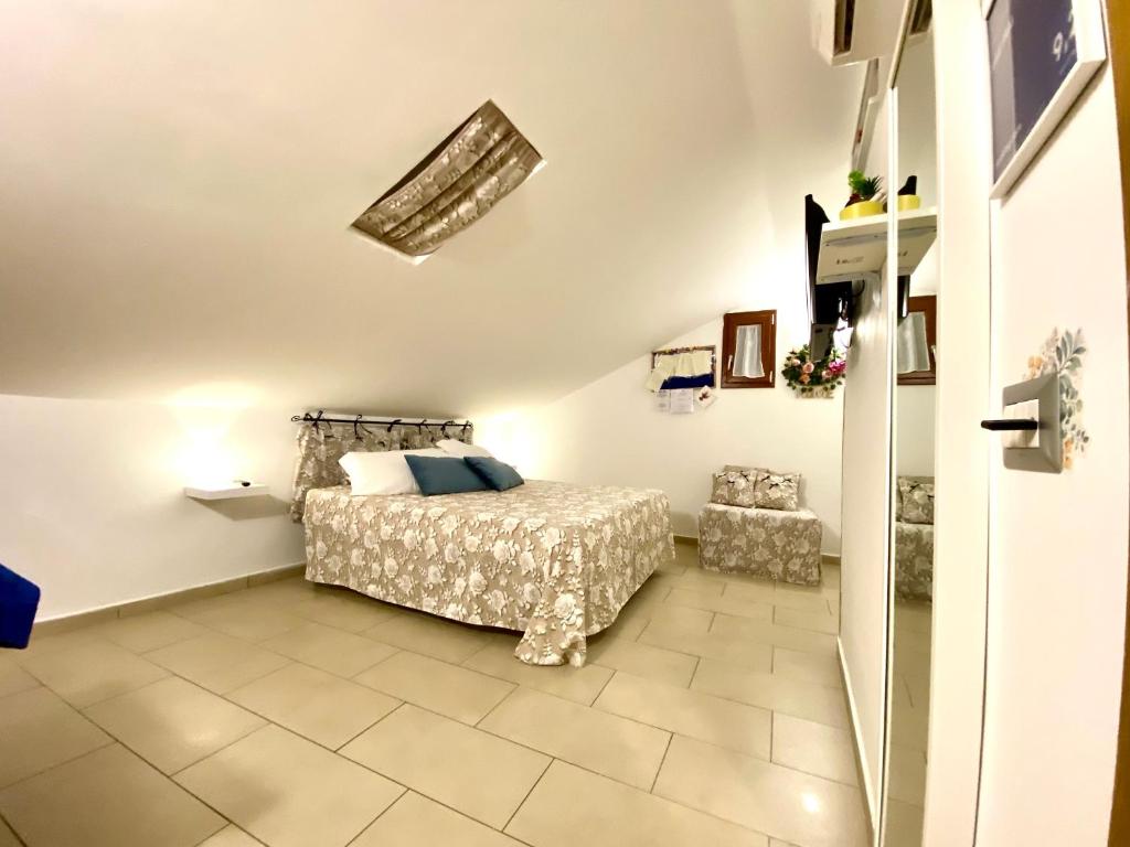 Postel nebo postele na pokoji v ubytování B&B FRAI