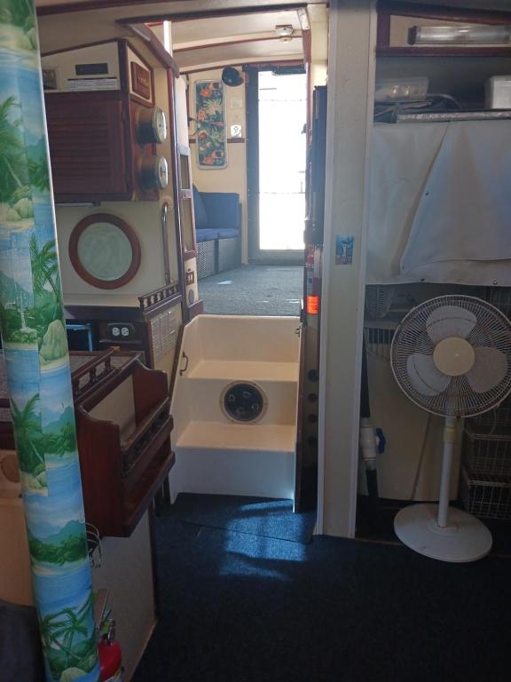 an interior view of an rv with a fan at Dream Lady in Jewfish