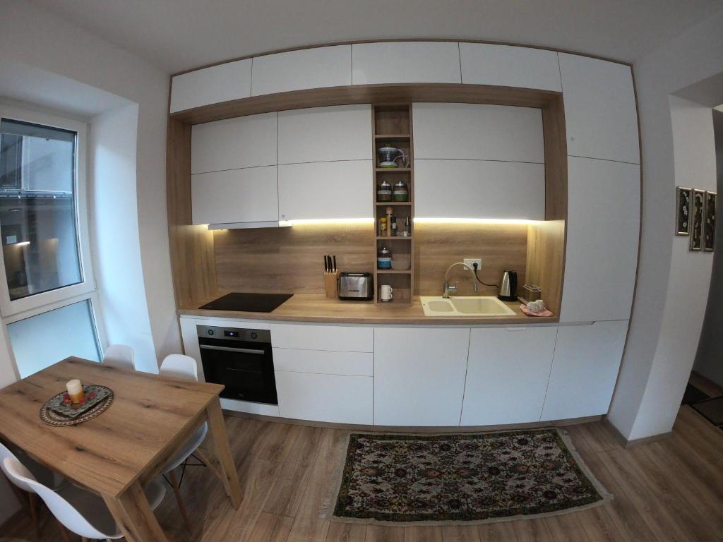 Kuchyň nebo kuchyňský kout v ubytování Murphy's Apartment
