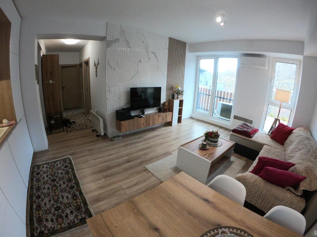 TV a/nebo společenská místnost v ubytování Murphy's Apartment