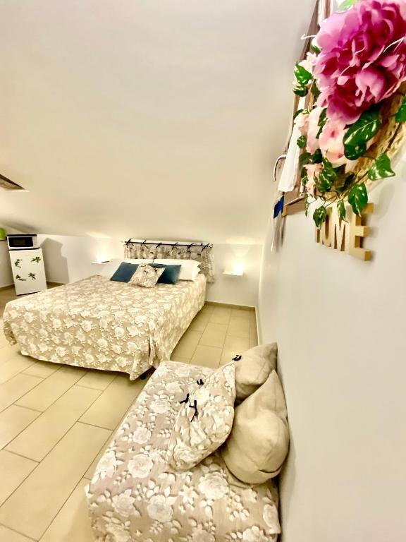 Postel nebo postele na pokoji v ubytování B&B FRAI