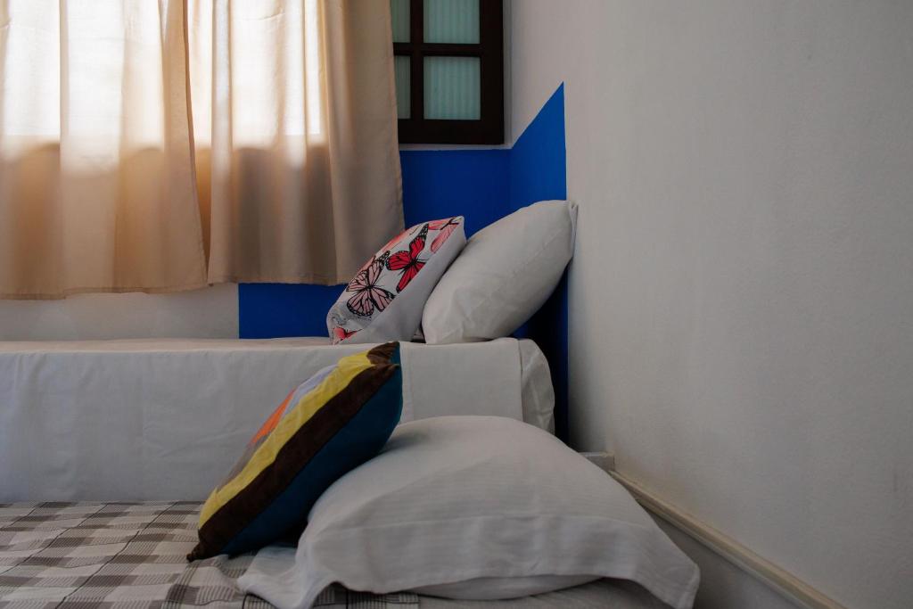 Postel nebo postele na pokoji v ubytování Pousada cachoeira de Paraty