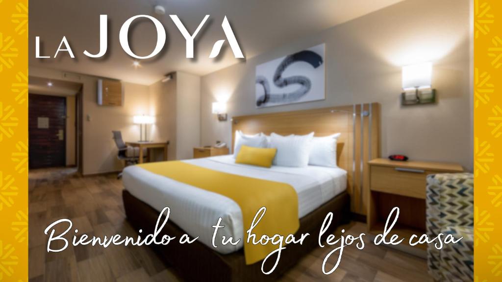 Postel nebo postele na pokoji v ubytování La Joya Pachuca