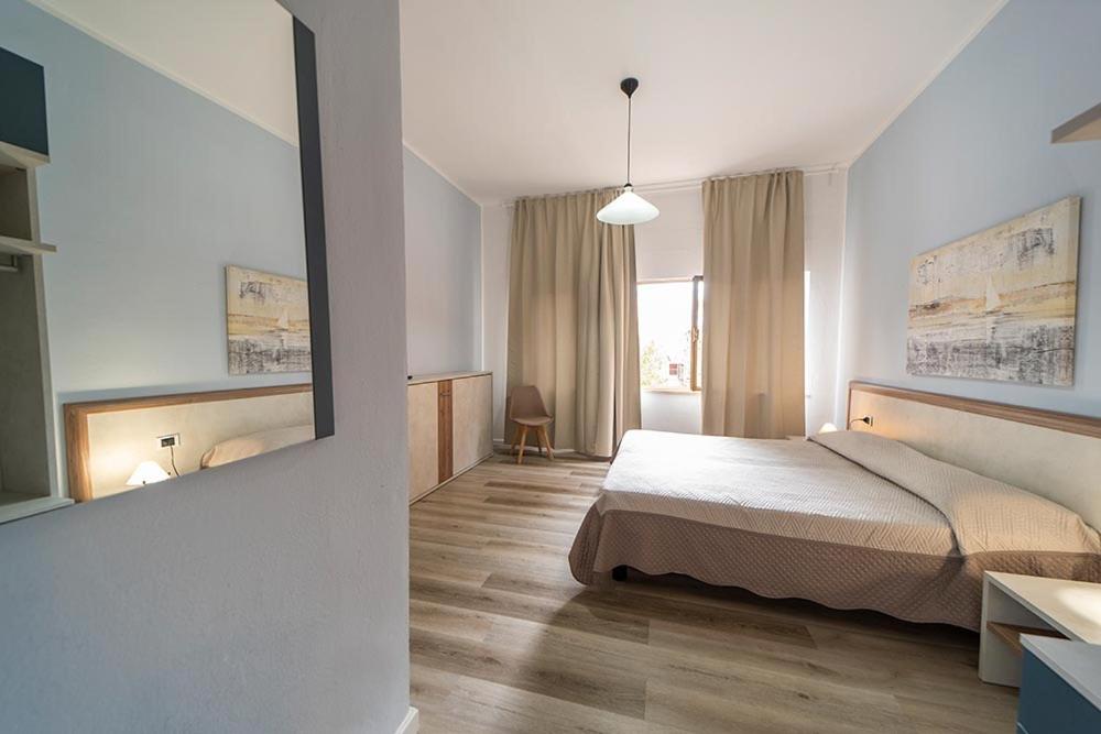 Postel nebo postele na pokoji v ubytování Hotel Belmare