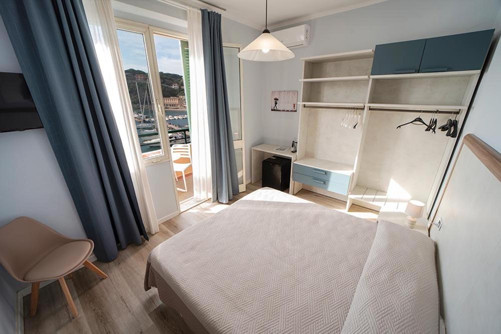 Postel nebo postele na pokoji v ubytování Hotel Belmare