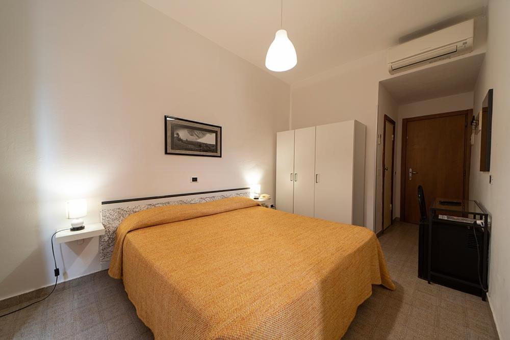 Postel nebo postele na pokoji v ubytování Hotel Belmare