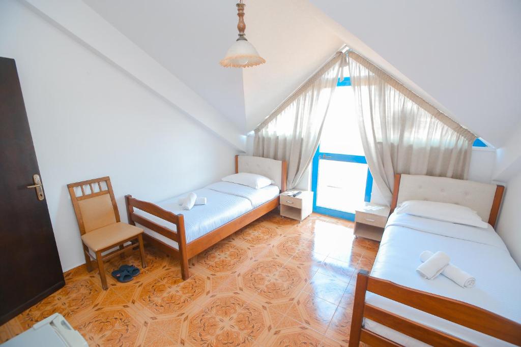 Postel nebo postele na pokoji v ubytování Hotel Ambasador
