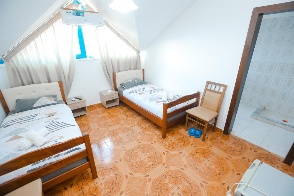 Postel nebo postele na pokoji v ubytování Hotel Ambasador