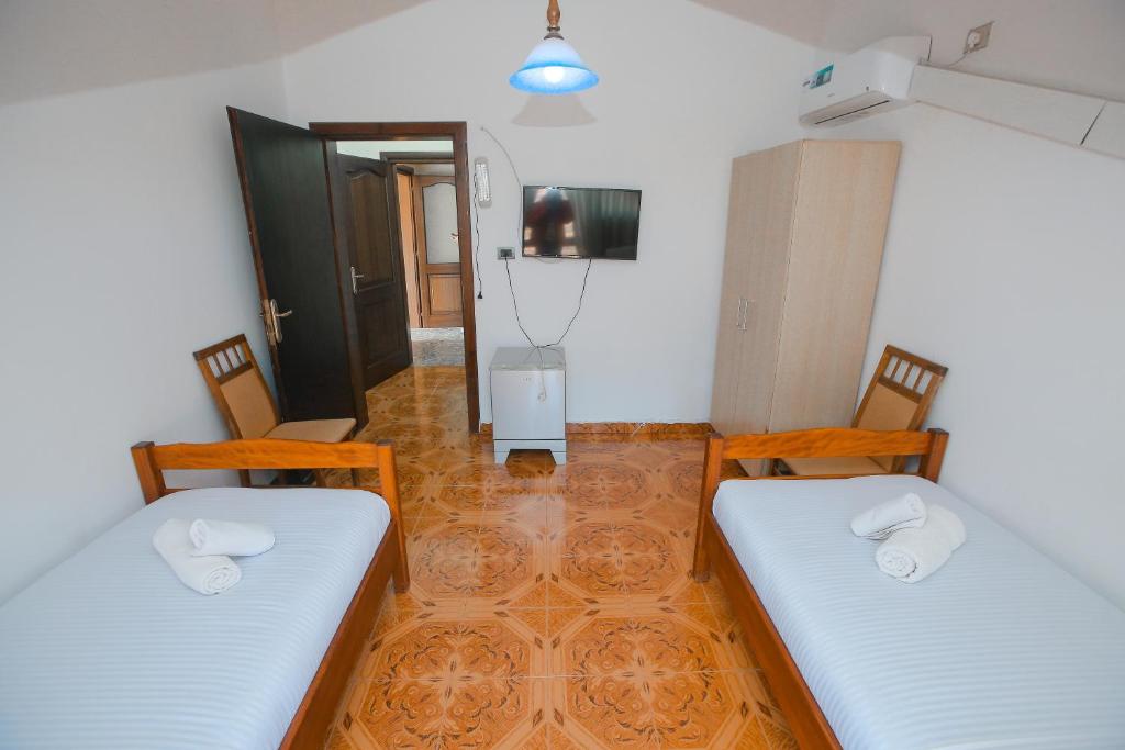 Postel nebo postele na pokoji v ubytování Hotel Ambasador