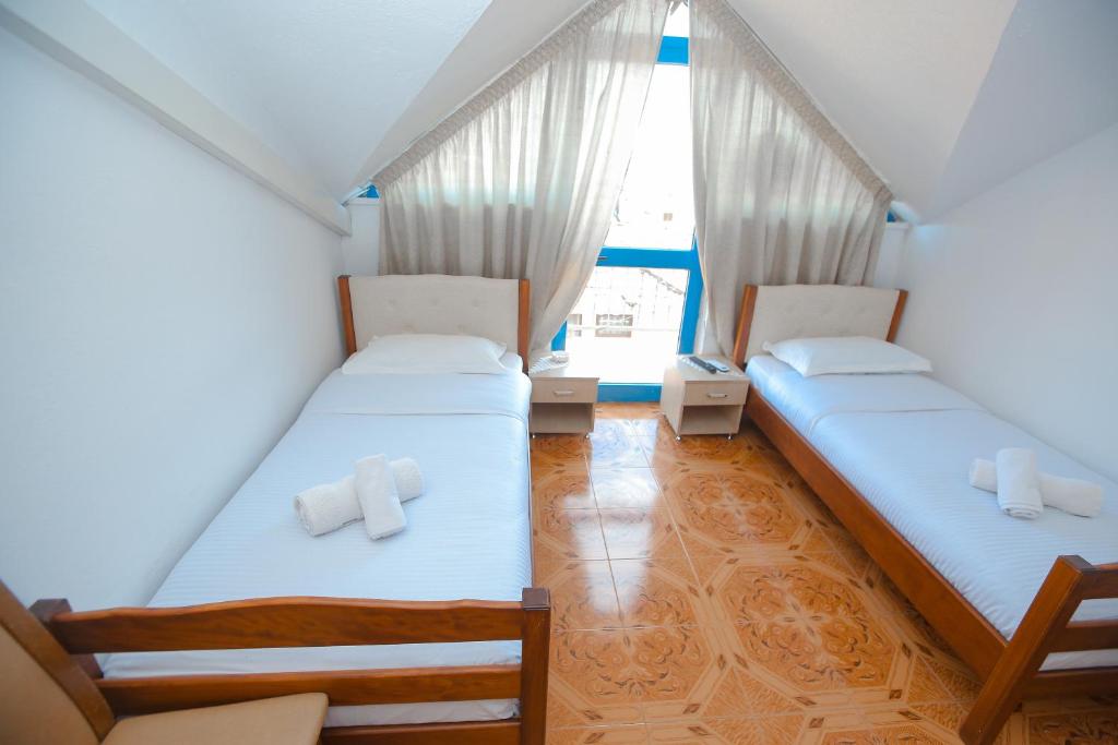 Postel nebo postele na pokoji v ubytování Hotel Ambasador
