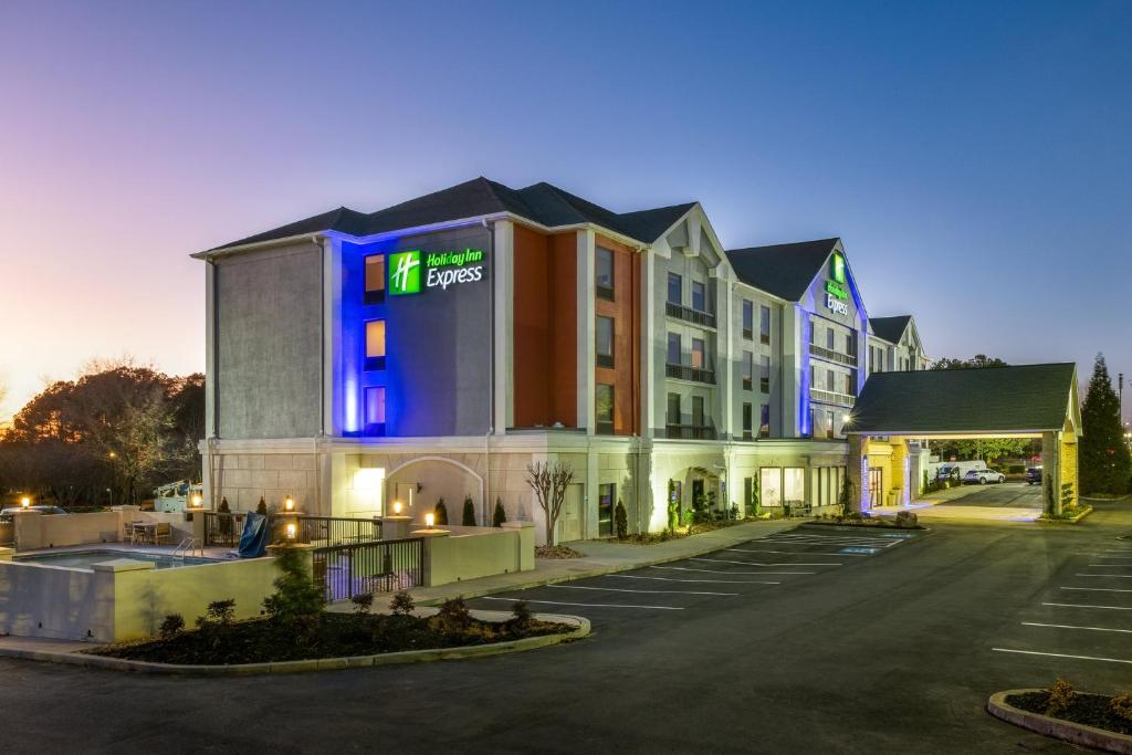 a rendering of a hotel with a parking lot at Holiday Inn Express Atlanta West - Theme Park Area, an IHG Hotel in Lithia Springs