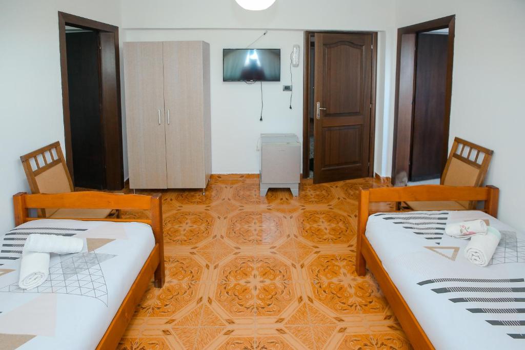 Postel nebo postele na pokoji v ubytování Hotel Ambasador