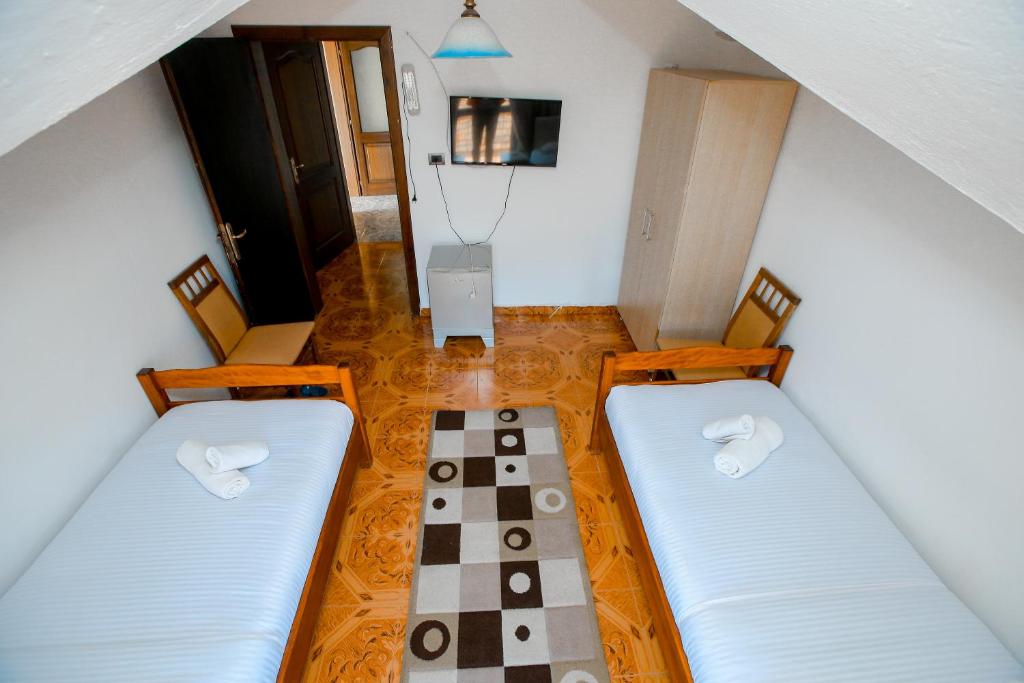 Postel nebo postele na pokoji v ubytování Hotel Ambasador