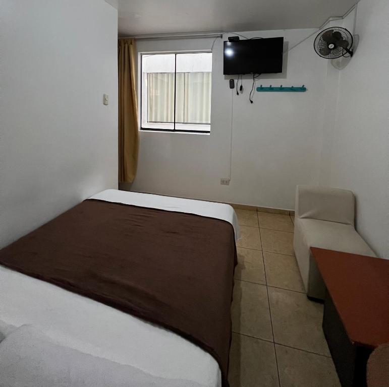 Postel nebo postele na pokoji v ubytování Hospedaje Senegal cerca al aeropuerto