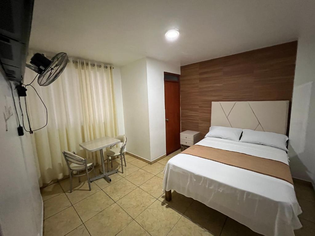 Postel nebo postele na pokoji v ubytování Hospedaje Senegal cerca al aeropuerto