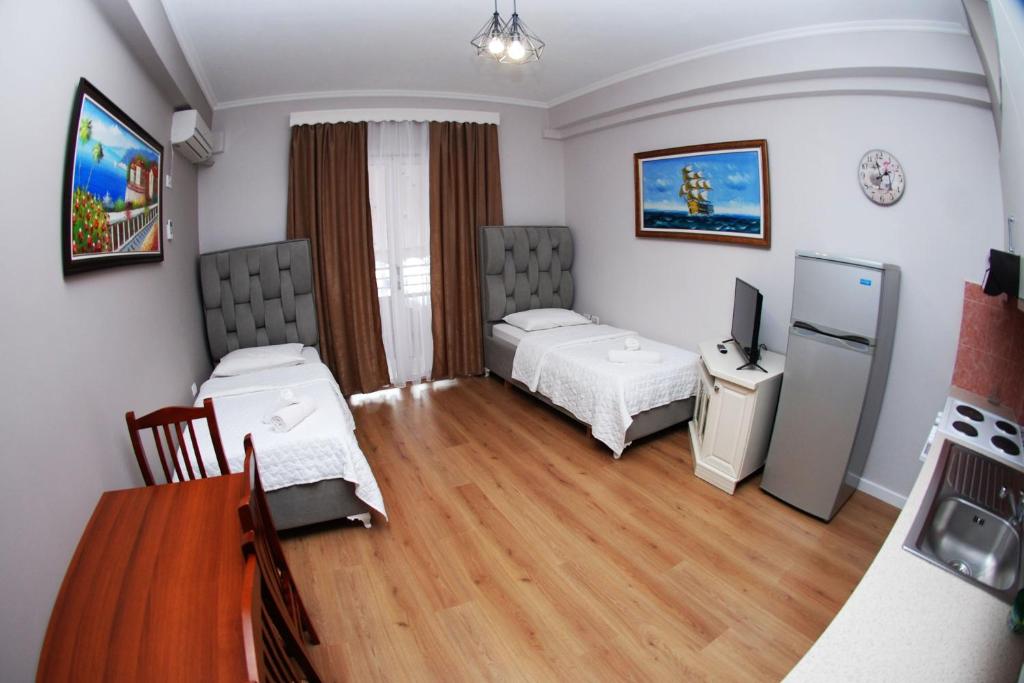 Krevet ili kreveti u jedinici u okviru objekta Hotel Vila Alvin & Apartments