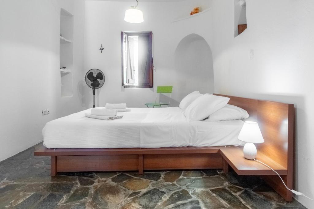 Voodi või voodid majutusasutuse Aegean Cottage Andros toas