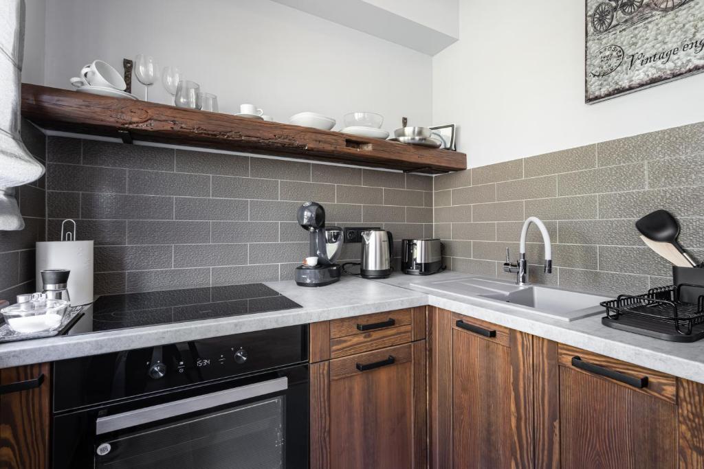 Kuchyň nebo kuchyňský kout v ubytování Radnoti Home