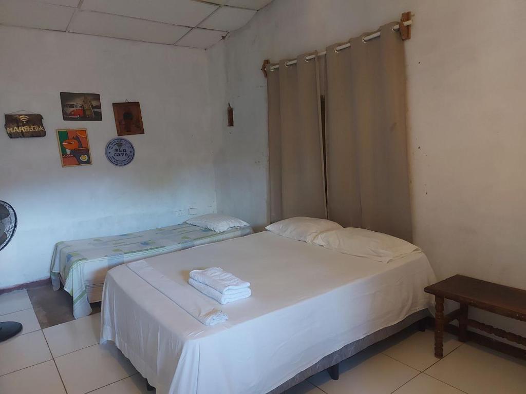Ліжко або ліжка в номері Hostal Brisas del Ometepe