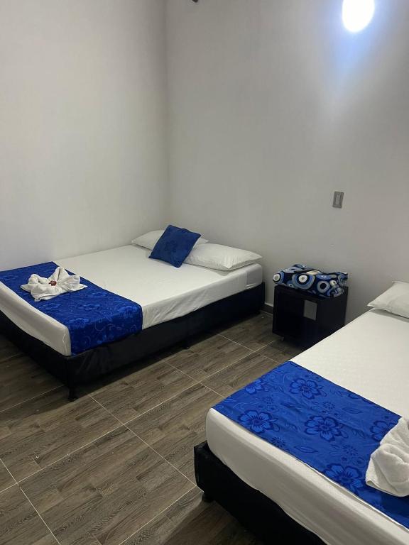 Postel nebo postele na pokoji v ubytování Hotel Santa Fe del Paso