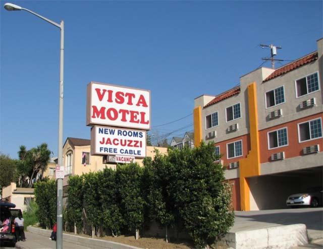 a vista motel sign in front of a building at Vista Motel in Los Angeles
