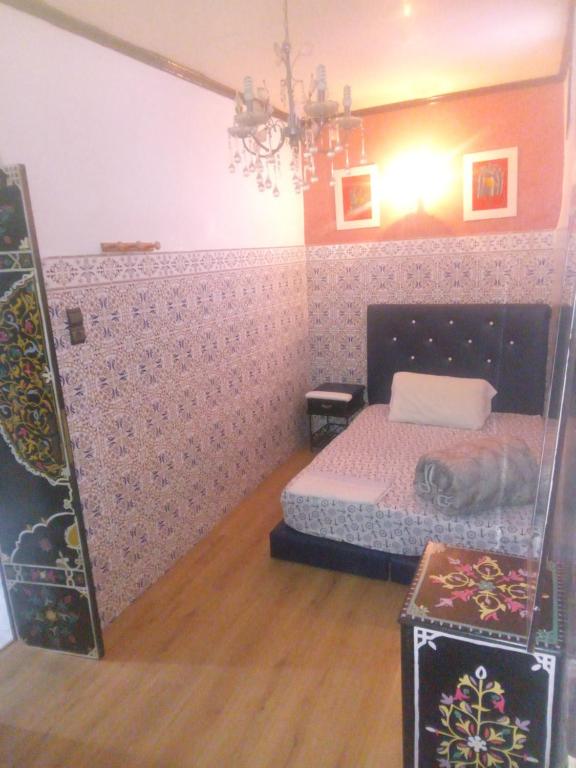 Llit o llits en una habitació de riad kamal
