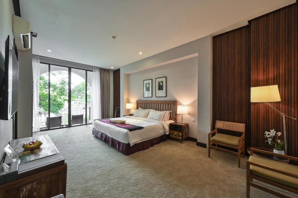 Postel nebo postele na pokoji v ubytování 1825 Gallery Hotel