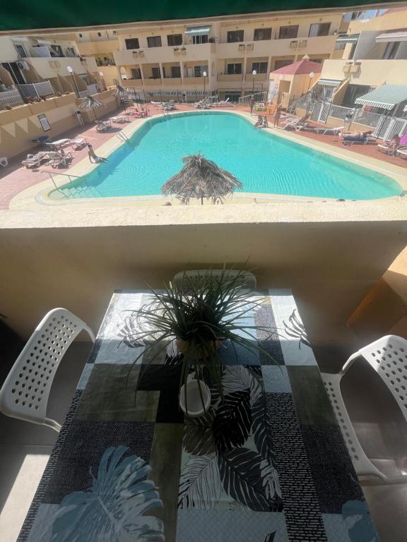 The swimming pool at or close to Sunny pool view & Airco apartament Symon Mareverde