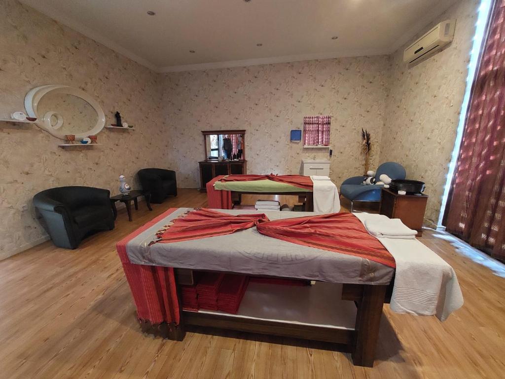 Postel nebo postele na pokoji v ubytování Blue Heaven Apart Hotel