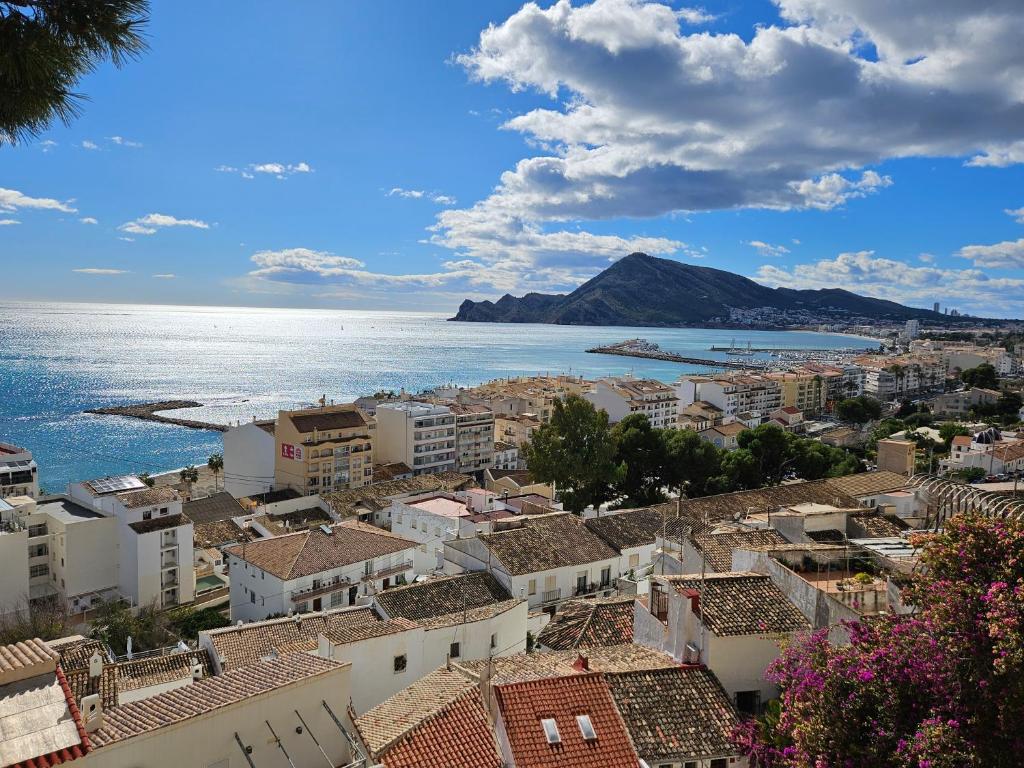 a view of a city and the ocean at HOSTAL LUXURY NIT I DIA in Altea