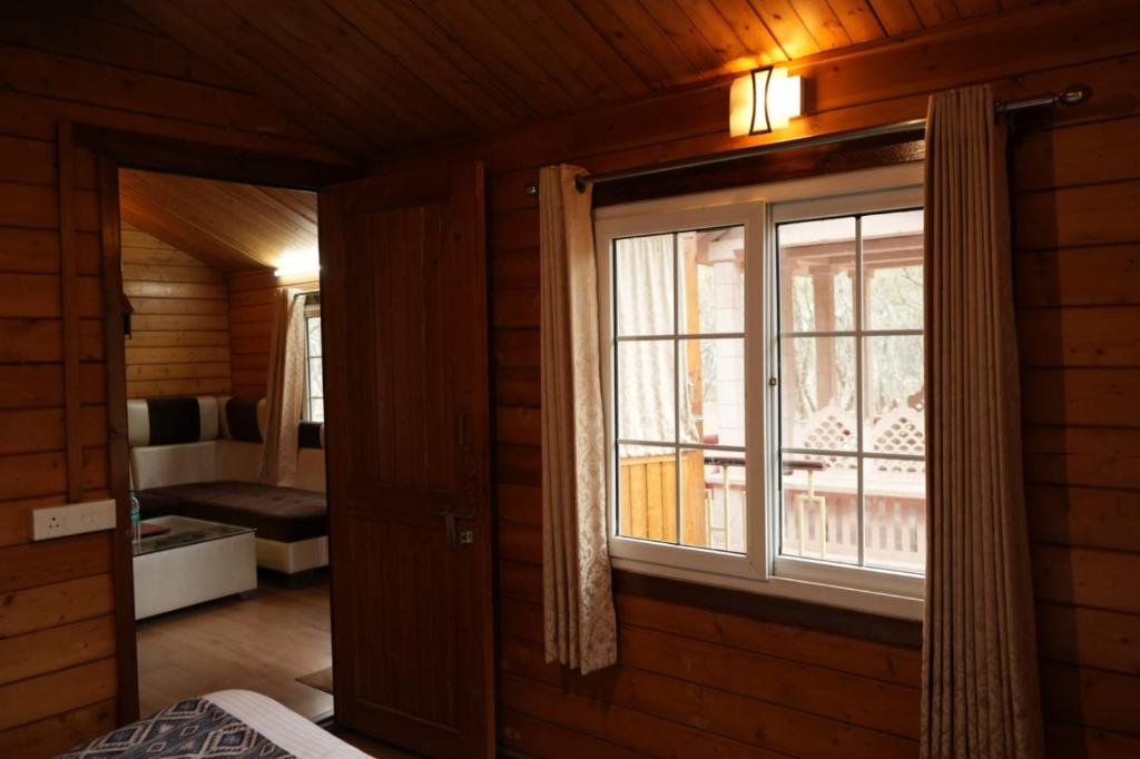 Postel nebo postele na pokoji v ubytování Namanbagh