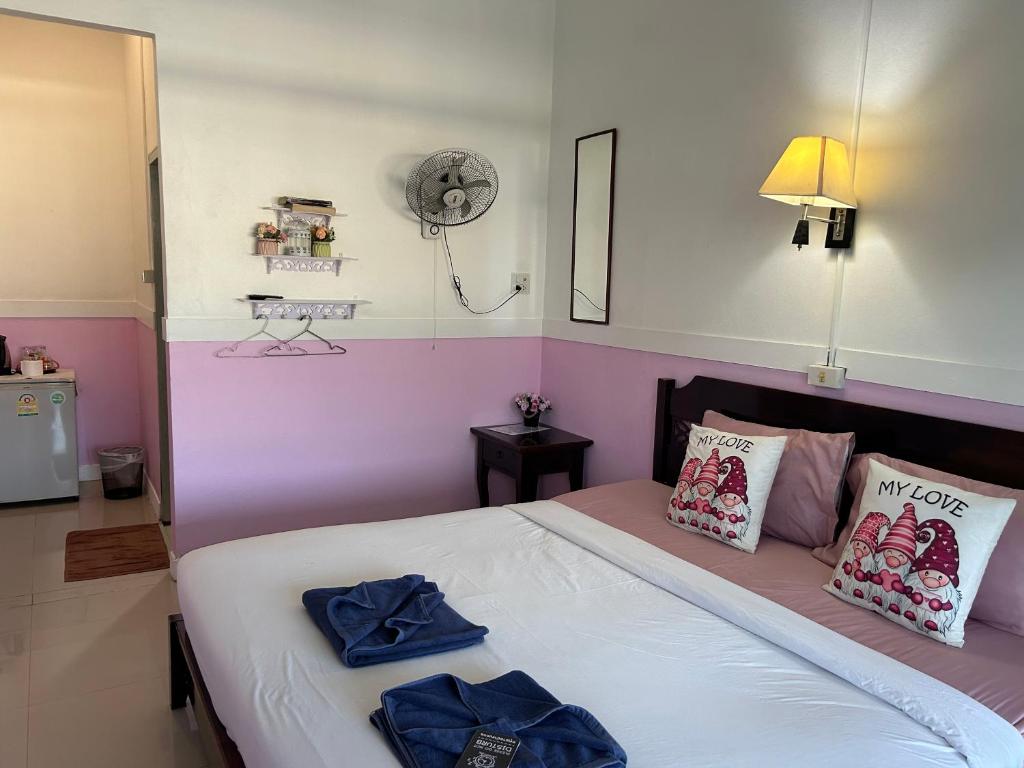 Postel nebo postele na pokoji v ubytování Labella samet guesthouse
