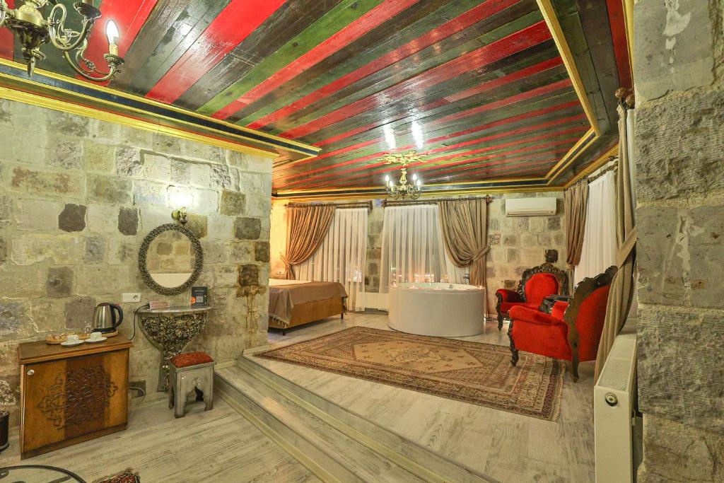 Posezení v ubytování Bedrock Cave Hotel