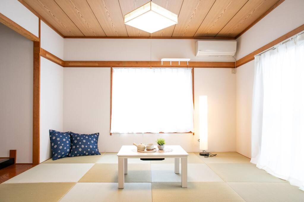 Posezení v ubytování Nagashima Riverside House 4